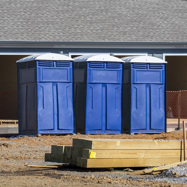 what is the cost difference between standard and deluxe porta potty rentals in Berry